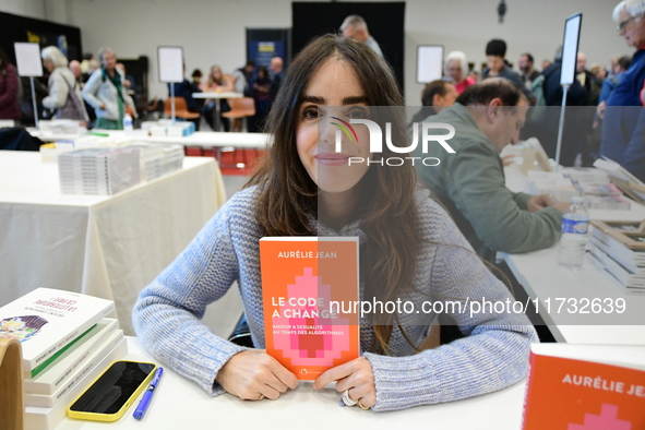 Aurelie Jean, a businesswoman, attends the first book fair in Valence, Drome, on November 2, 2024. 