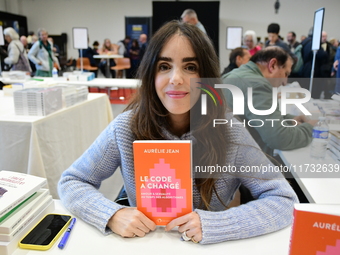 Aurelie Jean, a businesswoman, attends the first book fair in Valence, Drome, on November 2, 2024. (