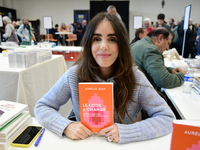 Aurelie Jean, a businesswoman, attends the first book fair in Valence, Drome, on November 2, 2024. (