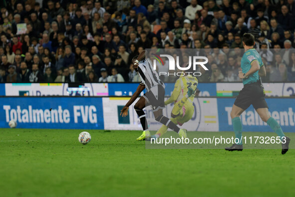 Keinan Davis of Udinese plays against Juan David Cabal of Juventus during the Italian Serie A Enilive soccer championship match between Udin...