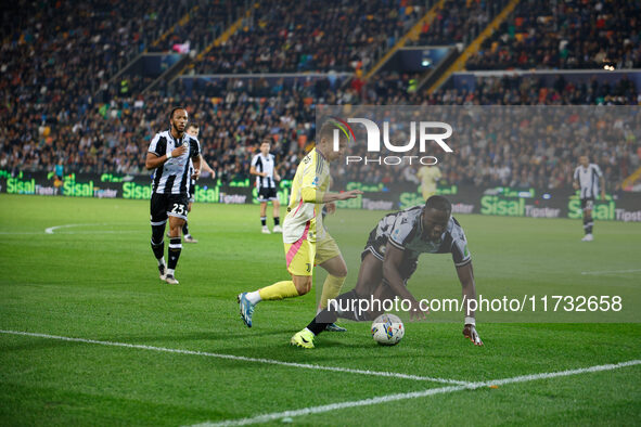 Francisco Conceicao of Juventus plays against Keinan Davis of Udinese during the Italian Serie A Enilive soccer championship match between U...