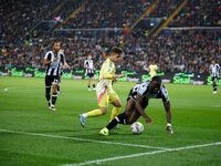 Francisco Conceicao of Juventus plays against Keinan Davis of Udinese during the Italian Serie A Enilive soccer championship match between U...