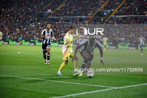 Francisco Conceicao of Juventus plays against Keinan Davis of Udinese during the Italian Serie A Enilive soccer championship match between U...