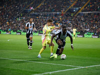 Francisco Conceicao of Juventus plays against Keinan Davis of Udinese during the Italian Serie A Enilive soccer championship match between U...