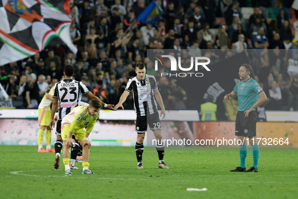 Jaka Bijol and Enzo Ebosse of Udinese participate in the Italian Serie A Enilive soccer championship football match between Udinese Calcio a...