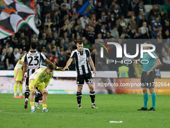 Jaka Bijol and Enzo Ebosse of Udinese participate in the Italian Serie A Enilive soccer championship football match between Udinese Calcio a...