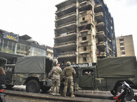 Lebanese security forces take measures in the area after the Israeli attack on an apartment building located at the intersection on the ''Se...