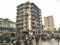 Lebanese security forces take measures in the area after the Israeli attack on an apartment building located at the intersection on the ''Se...