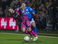 Ryan Rydel #23 of Stockport County F.C. tackles the opponent during the FA Cup First Round match between Stockport County and Forest Green R...