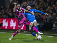 Ryan Rydel #23 of Stockport County F.C. tackles the opponent during the FA Cup First Round match between Stockport County and Forest Green R...