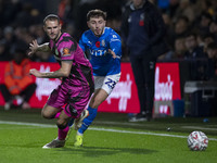 Ryan Rydel #23 of Stockport County F.C. tackles the opponent during the FA Cup First Round match between Stockport County and Forest Green R...