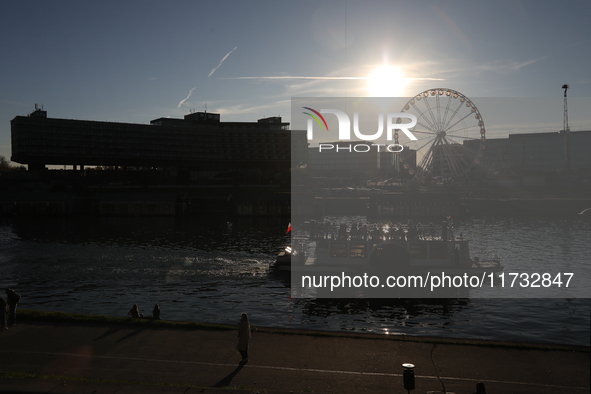 A boat is on the Vistula River in Krakow, Poland, on October 19, 2024. 