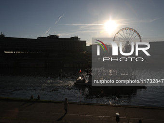 A boat is on the Vistula River in Krakow, Poland, on October 19, 2024. (