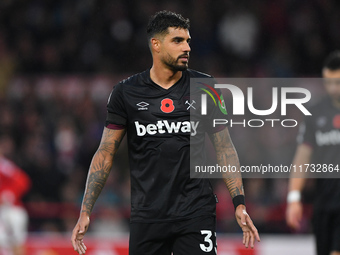 Emerson Palmieri of West Ham United participates in the Premier League match between Nottingham Forest and West Ham United at the City Groun...