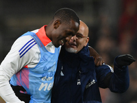 Willy Boly of Nottingham Forest and Julio Figueroa of Nottingham Forest celebrate victory during the Premier League match between Nottingham...