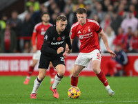 Jarrod Bowen of West Ham United is under pressure from Elliott Anderson of Nottingham Forest during the Premier League match between Notting...