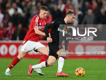 Jarrod Bowen of West Ham United is under pressure from Elliott Anderson of Nottingham Forest during the Premier League match between Notting...