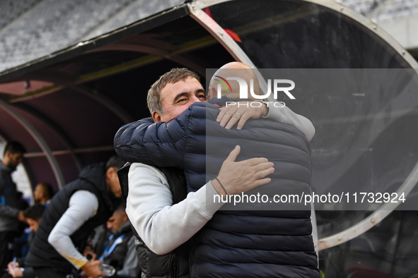 Gheorghe Hagi and Vasile Miriuta are in action during the Romanian Cup match between Sanatatea Cluj and Farul Constanta in Cluj, Romania, on...