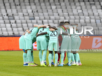 Players of Sanatatea Cluj participate in the Romanian Cup match, Sanatatea Cluj vs. Farul Constanta, in Cluj, Romania, on October 31, 2024,...