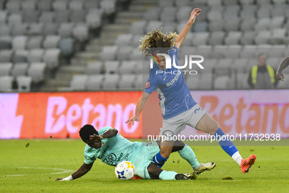 Alex Stoian and Joseph Aido are in action during the Romanian Cup match between Sanatatea Cluj and Farul Constanta at Cluj Arena in Cluj, Ro...