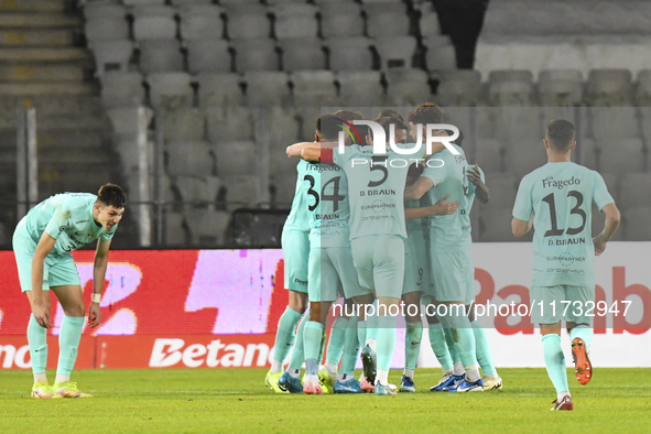 Players of Sanatatea Cluj celebrate during the Romanian Cup match between Sanatatea Cluj and Farul Constanta at Cluj Arena in Cluj, Romania,...