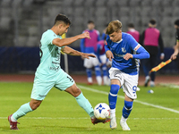 Catalin Cret and Luca Basceanu are in action during the Romanian Cup match between Sanatatea Cluj and Farul Constanta at Cluj Arena in Cluj,...