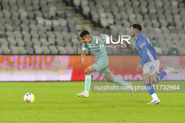 Denis Paul and Robert Mustaca are in action during the Romanian Cup match between Sanatatea Cluj and Farul Constanta at Cluj Arena in Cluj,...