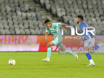 Denis Paul and Robert Mustaca are in action during the Romanian Cup match between Sanatatea Cluj and Farul Constanta at Cluj Arena in Cluj,...