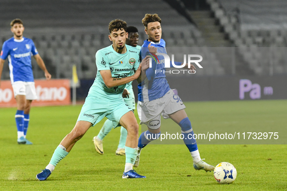 Luca Basceanu and Nicholas Pop are in action during the Romanian Cup match between Sanatatea Cluj and Farul Constanta at Cluj Arena in Cluj,...