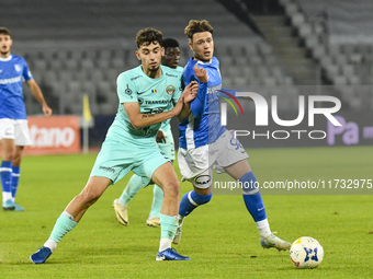 Luca Basceanu and Nicholas Pop are in action during the Romanian Cup match between Sanatatea Cluj and Farul Constanta at Cluj Arena in Cluj,...