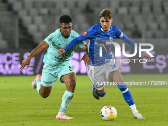 Luca Basceanu and Laley Fofana are in action during the Romanian Cup match between Sanatatea Cluj and Farul Constanta at Cluj Arena in Cluj,...