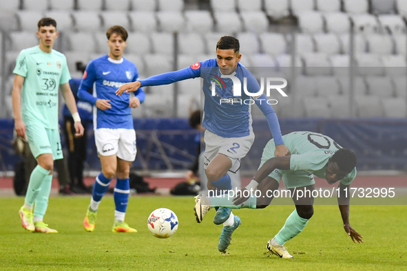 Joseph Aido and Ionut Cercel are in action during the Romanian Cup match between Sanatatea Cluj and Farul Constanta at Cluj Arena in Cluj, R...