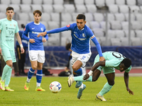 Joseph Aido and Ionut Cercel are in action during the Romanian Cup match between Sanatatea Cluj and Farul Constanta at Cluj Arena in Cluj, R...