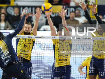 Paul Buchegger of Valsa Group Modena and Tommaso Rinaldi of Valsa Group Modena block during the match between Rana Verona and Valsa Group Mo...