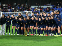 FC Barcelona players present the trophy for the best women's team in the world to the fans before the match between FC Barcelona Women and S...