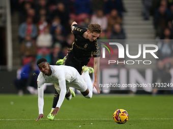 Isaiah Jones of Middlesbrough is fouled by Jack Rudoni of Coventry City during the Sky Bet Championship match between Middlesbrough and Cove...