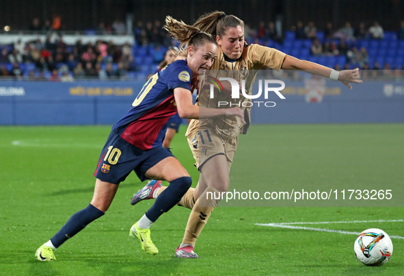 Caroline Graham Hansen and Laura Fernandez play during the match between FC Barcelona Women and SD Eibar Women, corresponding to week 8 of t...