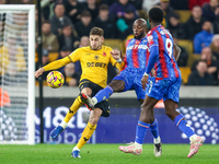 Santiago Bueno of Wolves, number 4, gets his toe to the ball during the Premier League match between Wolverhampton Wanderers and Crystal Pal...