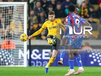 Santiago Bueno of Wolves, number 4, gets his toe to the ball during the Premier League match between Wolverhampton Wanderers and Crystal Pal...