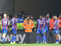 Marc Guehi of Crystal Palace (third from right) celebrates his goal with teammates during the Premier League match between Wolverhampton Wan...