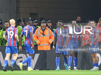 Marc Guehi of Crystal Palace (third from right) celebrates his goal with teammates during the Premier League match between Wolverhampton Wan...