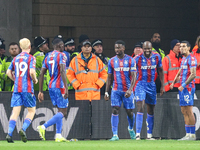 Marc Guehi of Crystal Palace (third from right) celebrates his goal with teammates during the Premier League match between Wolverhampton Wan...