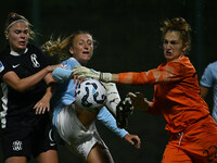 Mina Bergersen of F.C. Como Women, Federica D'Auria of S.S. Lazio, and Astrid Gilardi of F.C. Como Women are in action during the 8th day of...