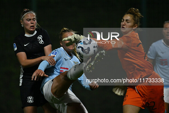 Mina Bergersen of F.C. Como Women, Federica D'Auria of S.S. Lazio, and Astrid Gilardi of F.C. Como Women are in action during the 8th day of...