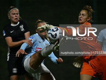 Mina Bergersen of F.C. Como Women, Federica D'Auria of S.S. Lazio, and Astrid Gilardi of F.C. Como Women are in action during the 8th day of...