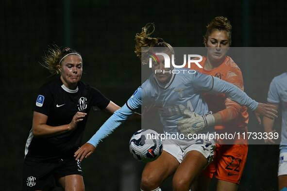 Mina Bergersen of F.C. Como Women, Federica D'Auria of S.S. Lazio, and Astrid Gilardi of F.C. Como Women are in action during the 8th day of...