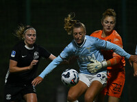 Mina Bergersen of F.C. Como Women, Federica D'Auria of S.S. Lazio, and Astrid Gilardi of F.C. Como Women are in action during the 8th day of...