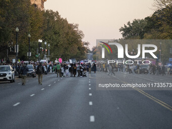 The women's march takes place in Washington, D.C., on November 2, 2024, where thousands of people gather at Freedom Plaza. Eight counter-pro...