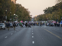 The women's march takes place in Washington, D.C., on November 2, 2024, where thousands of people gather at Freedom Plaza. Eight counter-pro...