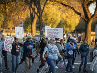 The women's march takes place in Washington, D.C., on November 2, 2024, where thousands of people gather at Freedom Plaza. Eight counter-pro...